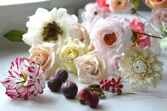 Handcrafted sugar flowers and berries.